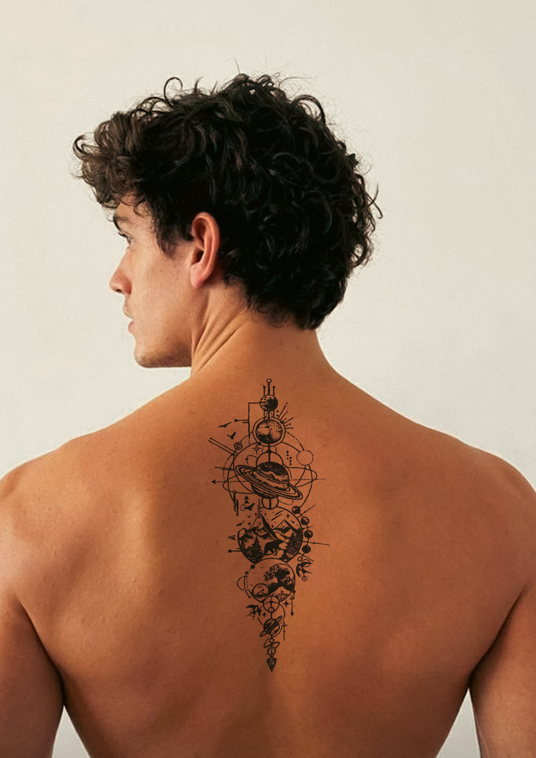 Compass tattoos on back