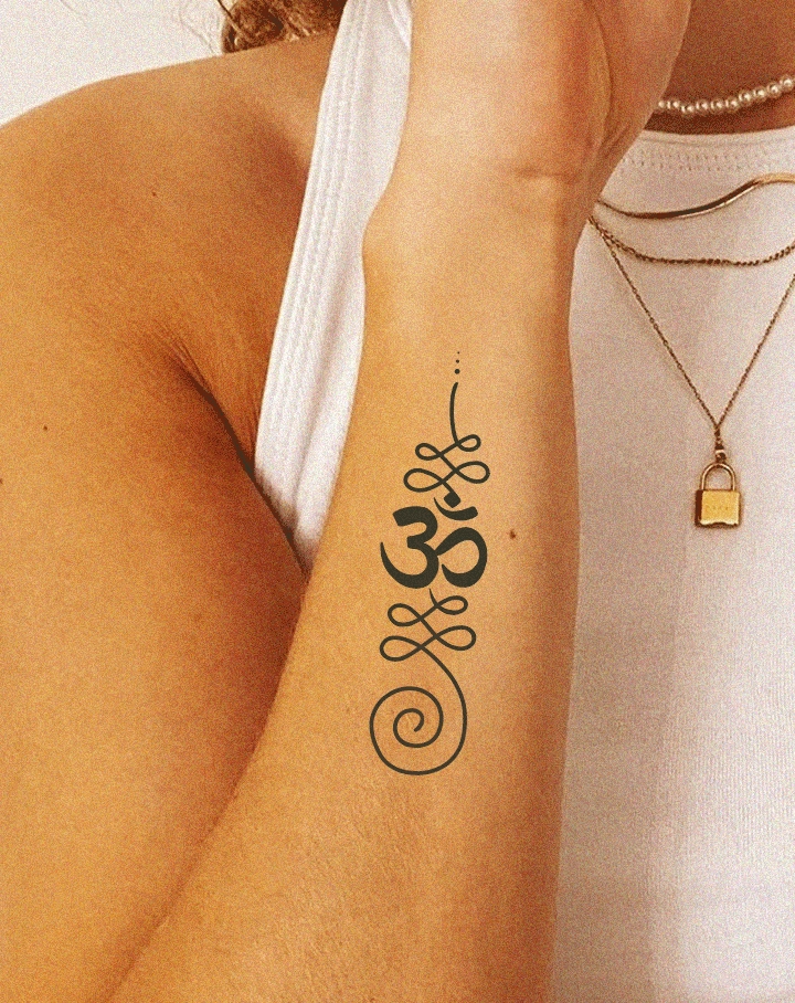 Om tattoos put on sholder