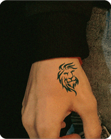 lion tattoo on hand