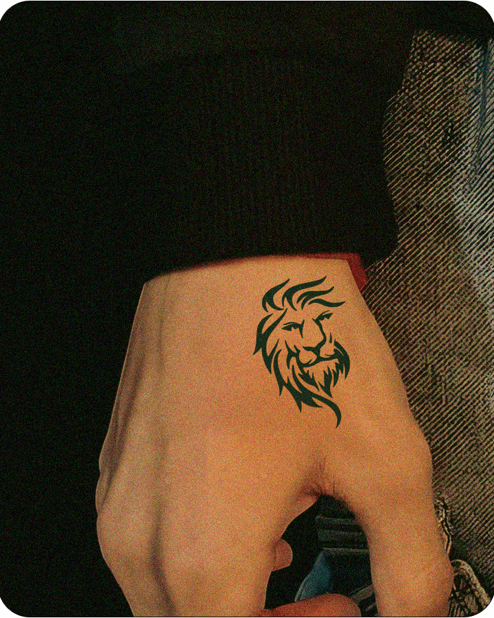 lion tattoo on hand